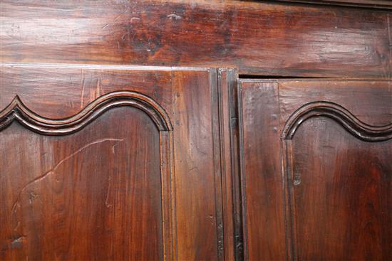 An 18th century French fruitwood armoire W.150cm
